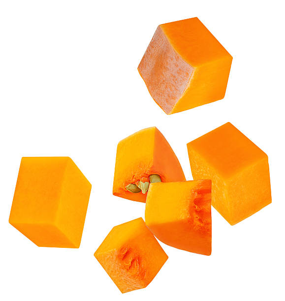 istock Flying Pumpkin pieces isolated on white. Pumpkin pieces Explosion. Levitating  Pumpkins 2246017661