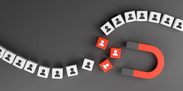 istock Customer Attraction Strategy with Magnet and People Icons on Dark Background 2246018689