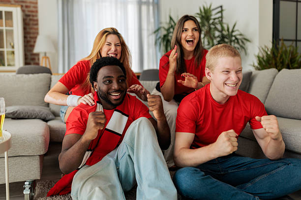 istock Friends Celebrating and Having Fun While Watching Sports Match 2246018737