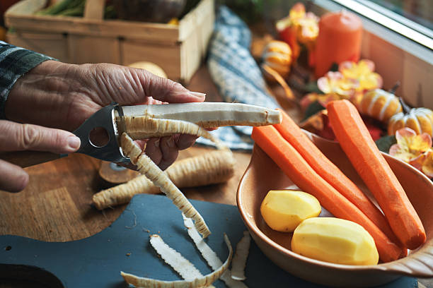 istock Cutting Root Vegetables on Wooden Board 2246020627