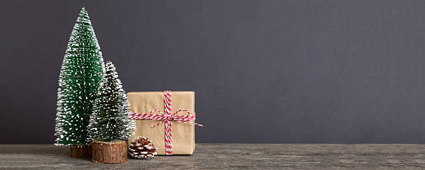 istock Christmas composition. Gifts, small tree, branches and craft DIY decorations on white background. New year concept. Christmas home decoration Flat lay, top view, copy space 2246021391