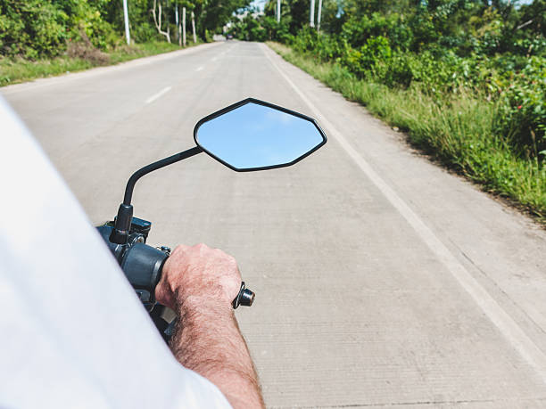 istock Attractive man riding a motorcycle. Sunny day 2246022848