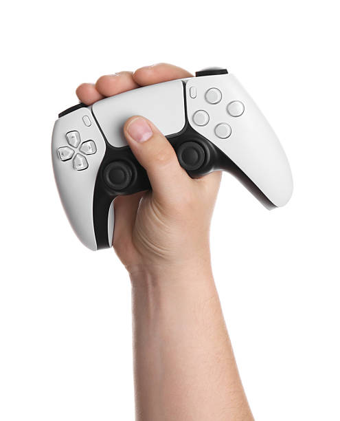 istock Woman holding wireless game controller on white background, closeup 2246023726