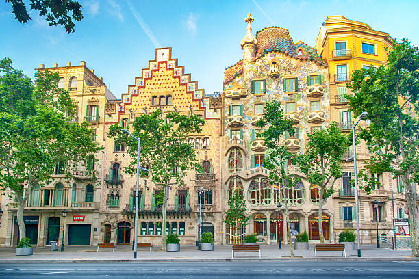 Casa Batlló by Antoni Gaudí and Casa Amatller by Josep Puig i Cadafalch, two iconic buildings in Barcelona, stand side by side as masterpieces of Catalan Modernisme