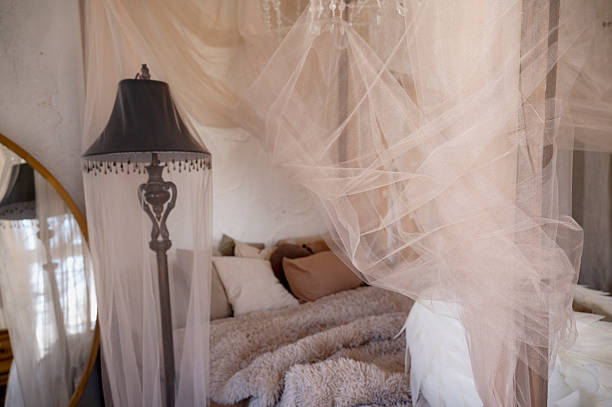 istock A cozy bedroom with pillows and a beige fluffy bedspread. 2246029342