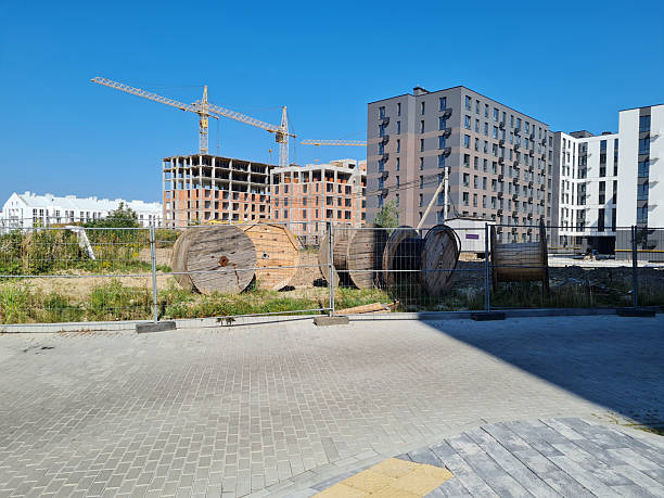 istock Urban construction site with cranes and new buildings 2246034659