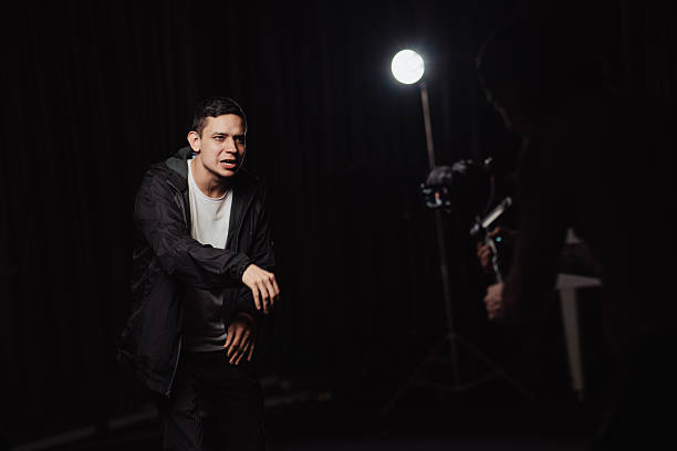 istock Man recording a music video in a studio 2246035740