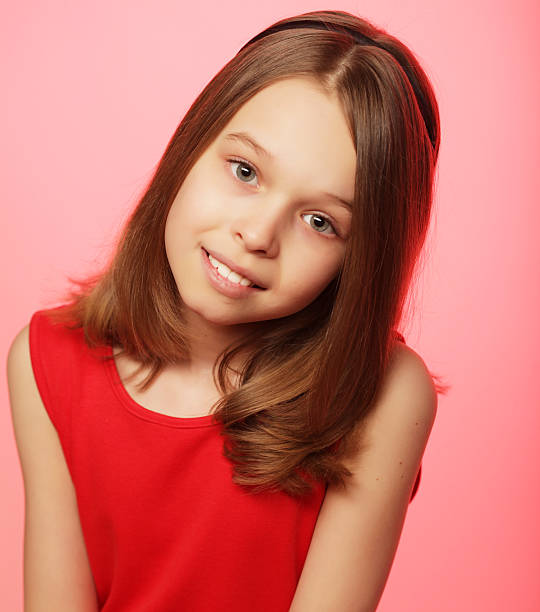 Cute smiling little blond girl