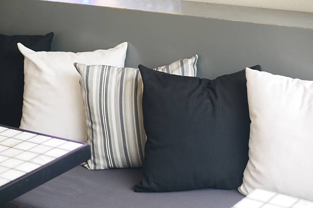 istock Cushions arranged on a cozy seating area in a cafe 2246036269