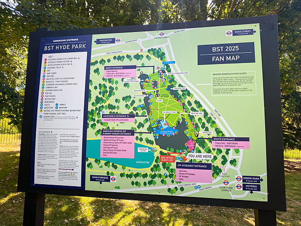 London, UK - July 10, 2025: Map of Hyde Park showing paths, lakes, and attractions on a sunny summer day