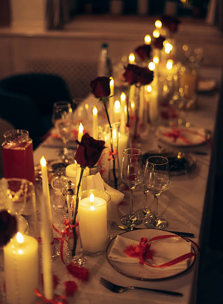 istock Warm candlelit banquet table with roses and crystal decor in restaurant 2246038186
