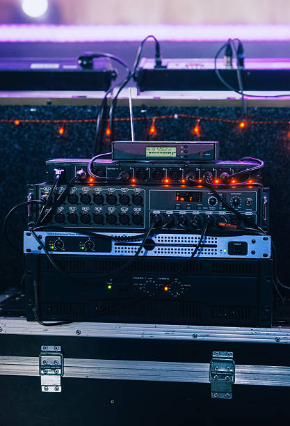 istock Professional audio rack setup with illuminated sound equipment 2246041564