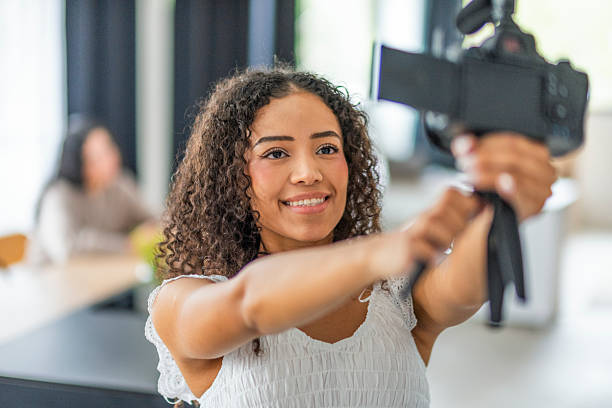 istock young bloggers documenting their daily lives from home 2246043631