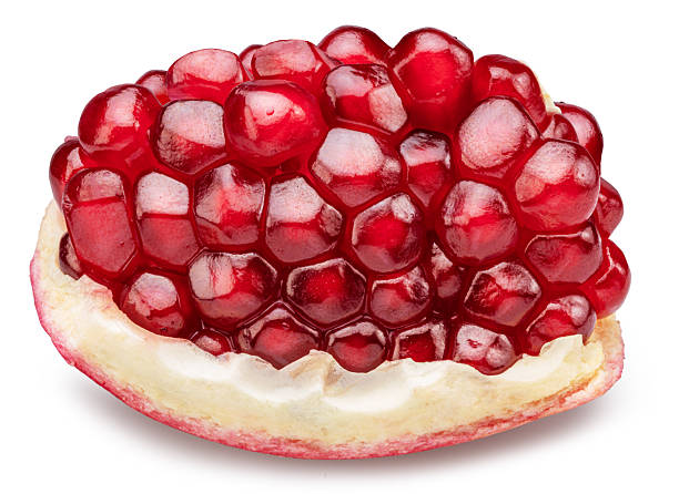 istock Pomegranate piece with pomegranate seeds isolated on a white background. Clipping path. Stacking focus, maximum detail. 2246045904