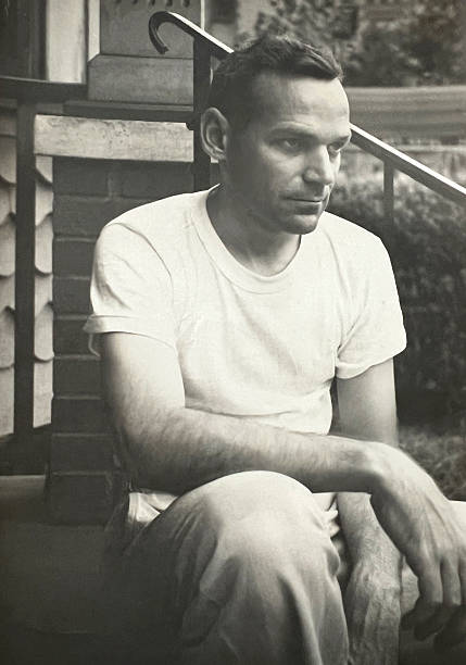 Black and white photograph of a man in the 1950s.