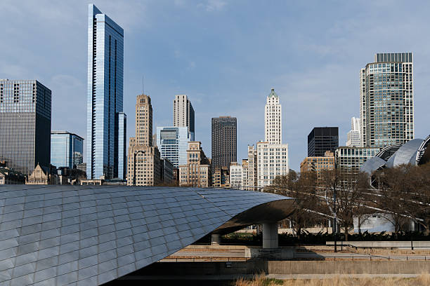 istock Chicago cityscape featuring iconic architecture against a cloudy sky on a sunny day. 2246049318