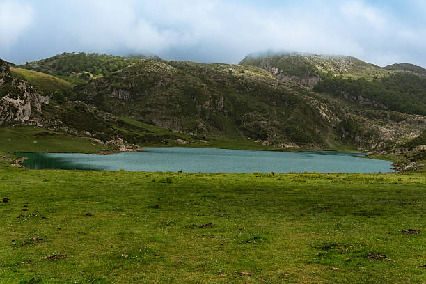 Lake Ercina in Covadonga, Asturias, Spain with clouds clearing