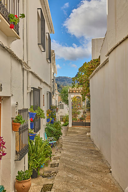istock Whitewashed alley in a traditional spanish village 2246052209