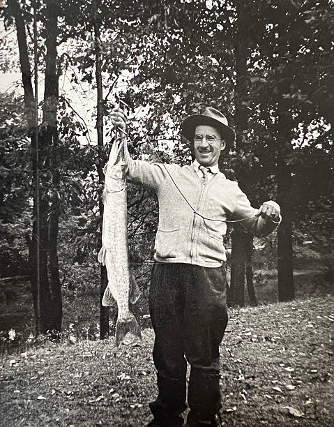 istock Man with Muskie Fish 1930s 2246052883