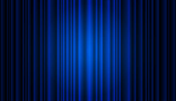 istock A blue theater curtain, a wavy velvet drape illuminated by a circular spotlight. Vector background for a luxurious Broadway show presentation or awards ceremony on stage. 2246053852