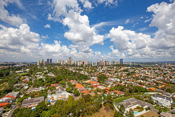 Iin the outskirts of Sao Paulo and near the town of Barueri in the background, lies Alphaville with its residential houses, tall buildings and condominiums
