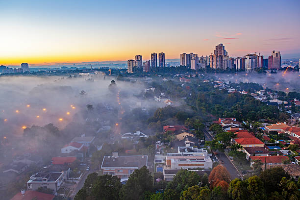 Iin the outskirts of Sao Paulo and near the town of Barueri in the background, lies Alphaville with its residential houses, tall buildings and condominiums