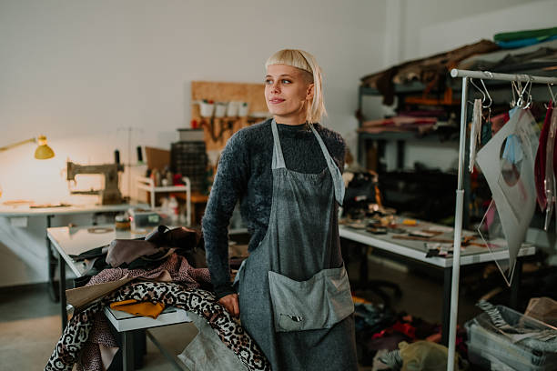 istock Female artisan creating fashion designs in her workshop 2246056240