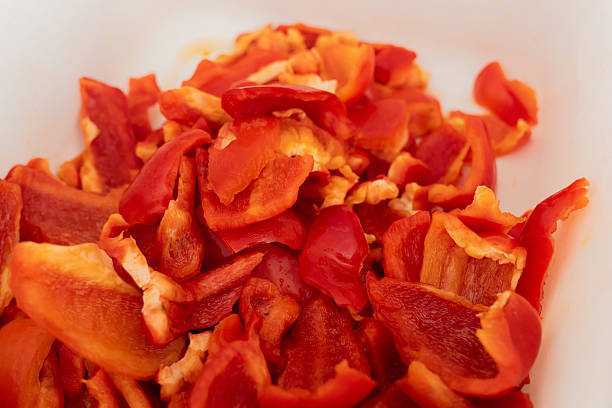 istock Red Bell organic Peppers sliced for food prep 2246059131