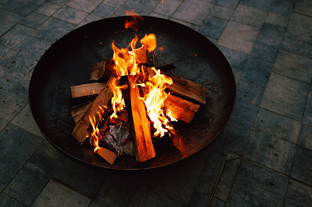 istock serene hotel courtyard features circular fire bowl emitting gentle orange light across tiled surface 2246060897