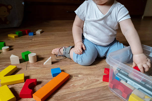 istock Child Building Colorful Eco-Friendly Block Tower 2246061310