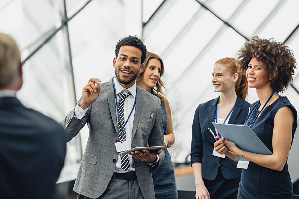 istock Diverse Business Executives Engaging Enthusiastically with Presenter at Conference Event 2246061882