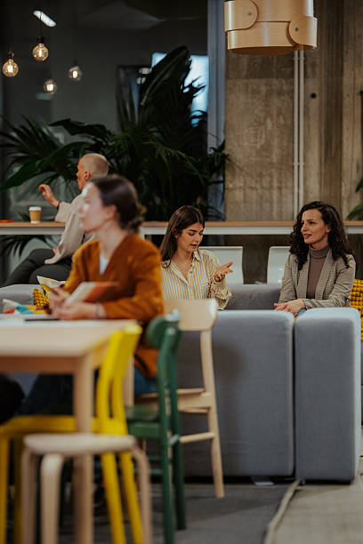 istock Casual team meeting in modern coworking office 2246064713