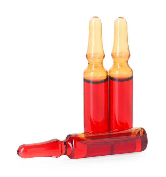 istock Glass ampoules with liquid isolated on white 2246064744