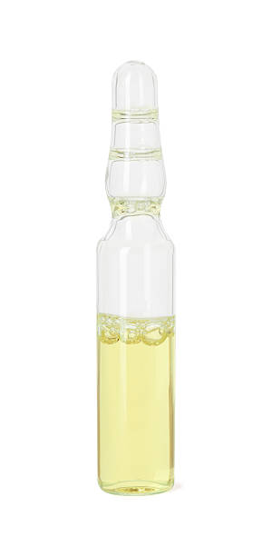 istock One glass ampoule with liquid isolated on white 2246064801
