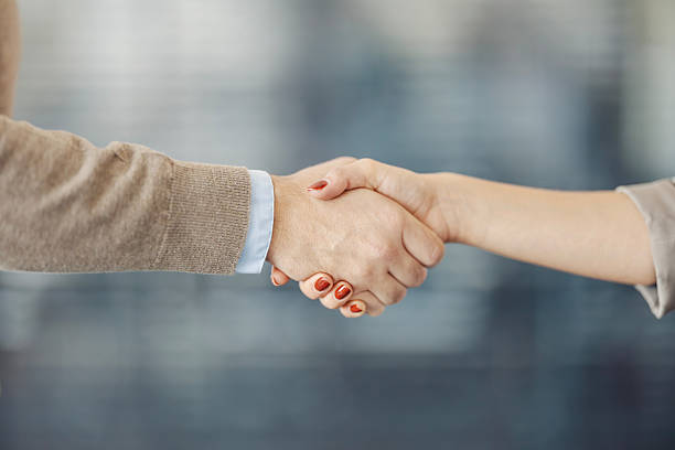 istock Business people shaking hands and closing a deal 2246065457