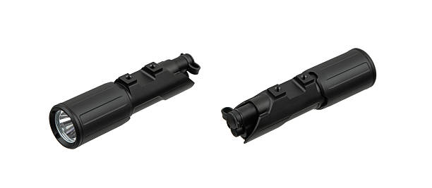 istock Two identical black tactical flashlights for firearms, one reversed, isolated on white. 2246068119