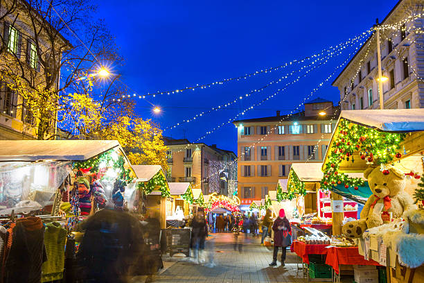 istock Christmas MARKET  - blurred motion people,, cafe and Piazza Riformo 2246068771
