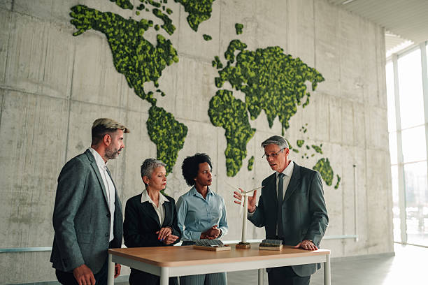 istock Business team discussing renewable energy solutions and sustainability strategy 2246070572