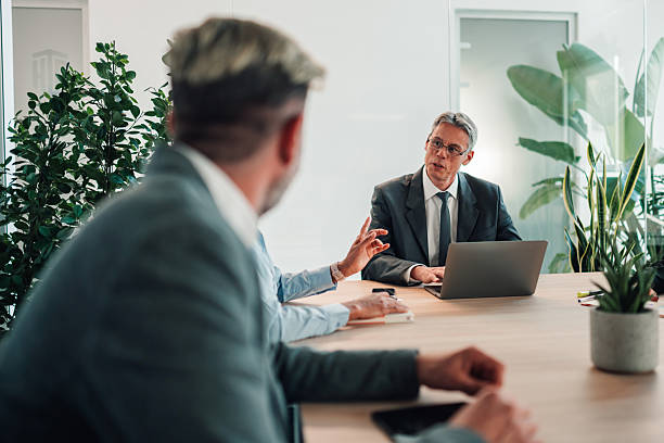 istock Business people having corporate meeting in modern office 2246070616