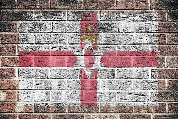 A Northern Ireland flag on old brick wall background