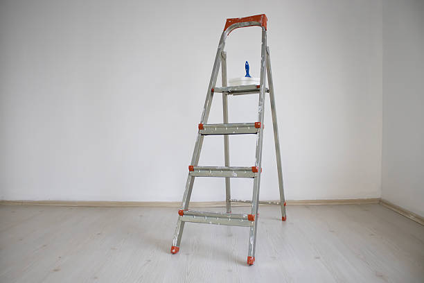 istock Ladder and Paint Brush in Empty Room 2246072399