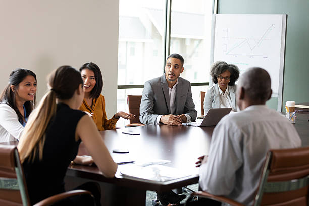 istock Diverse group of professionals in a collaborative business meeting discussing strategy. 2246074142