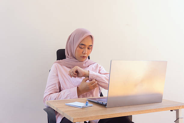istock Professional woman working with laptop at her desk 2246076349