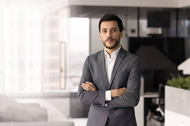 istock Serious young Middle Eastern business executive man posing in office 2246077394