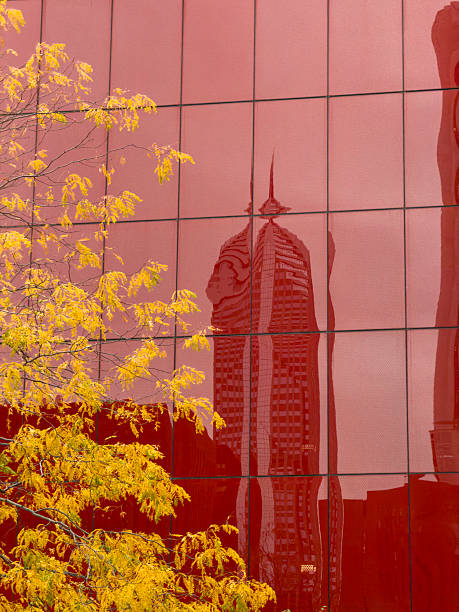 Colorful office building reflection with yellow tree autumn colors, Chicago, Illinois
