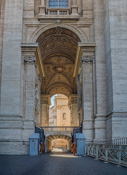 Vatican City, Rome, Italy - July 16, 2024: Saint Peter Basilica. Swiss guards at south-east side of the Basilica