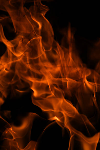 Texture of fire on a black background. Abstract fire flame background, large burning fire