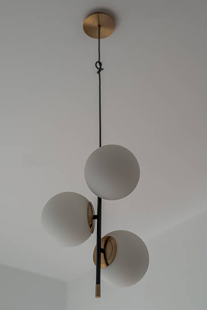 istock Minimalist pendant with opal globes in modern Gdansk apartment 2246081794