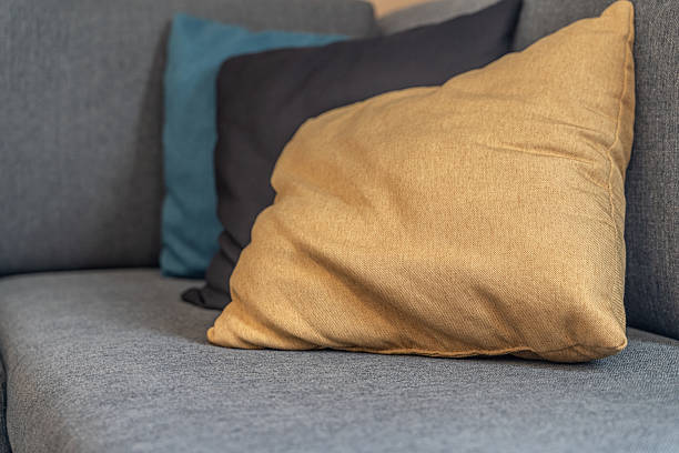 istock Cushions on a sofa at home - Interior design 2246082804
