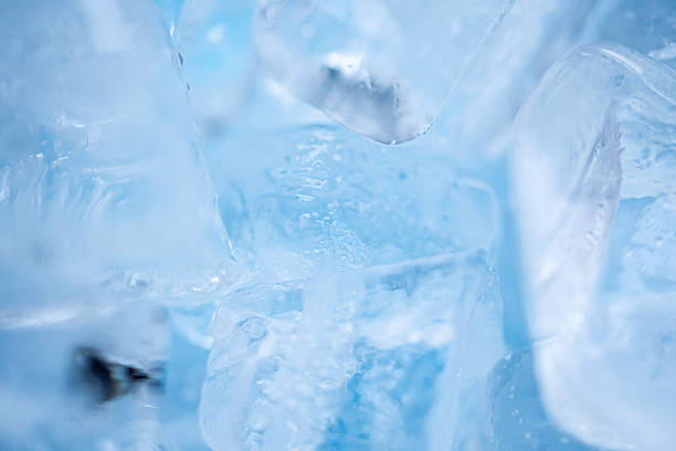 istock Pieces of crushed ice background close up 2246084935